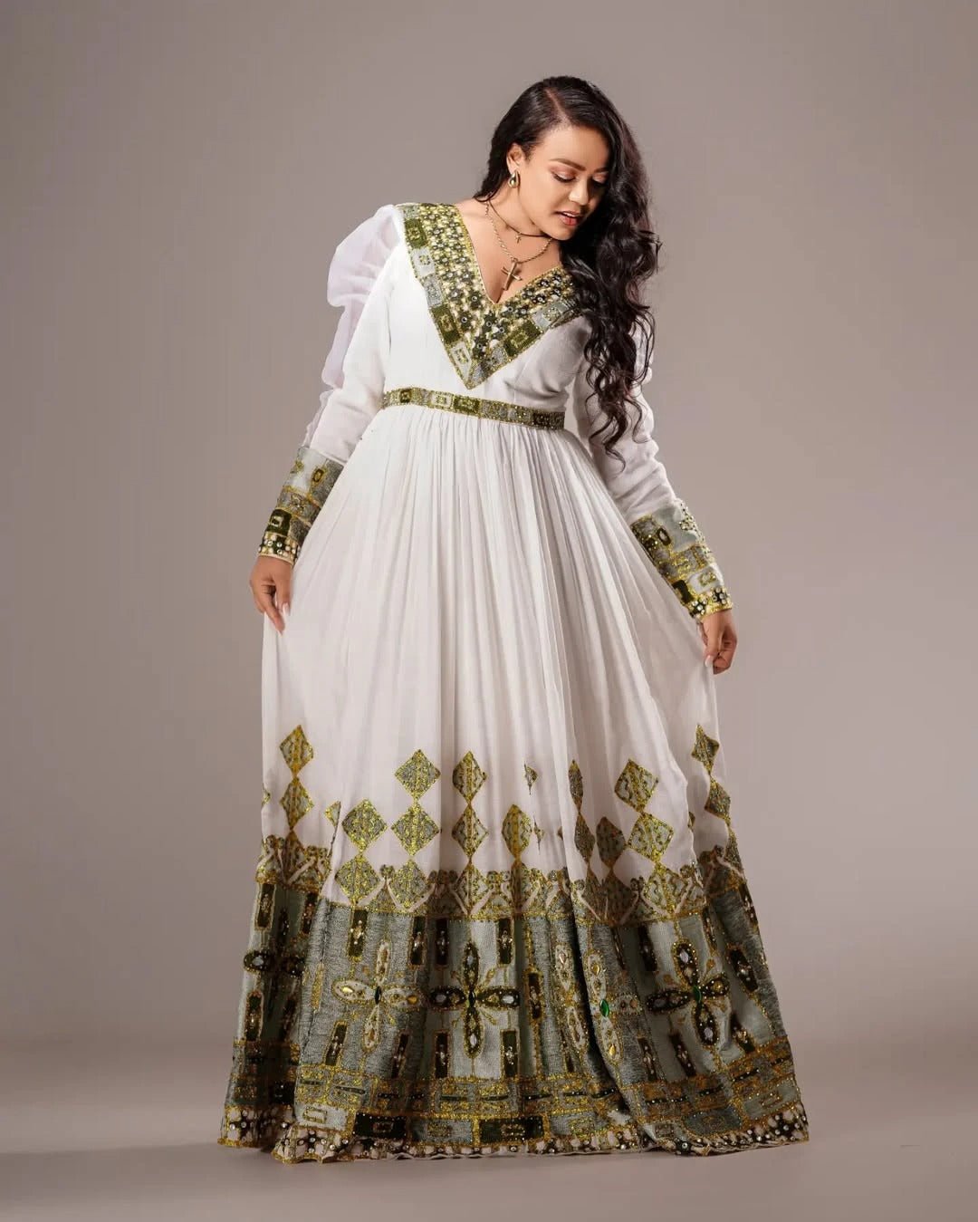 Classy Light Green Habesha Kemis with Golden Patterns