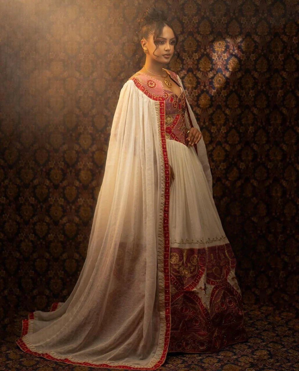 Glamorous Traditional Ethiopian Dress with Gold, Rich Red and Soft Pink Embroidery for Stunning Weddings