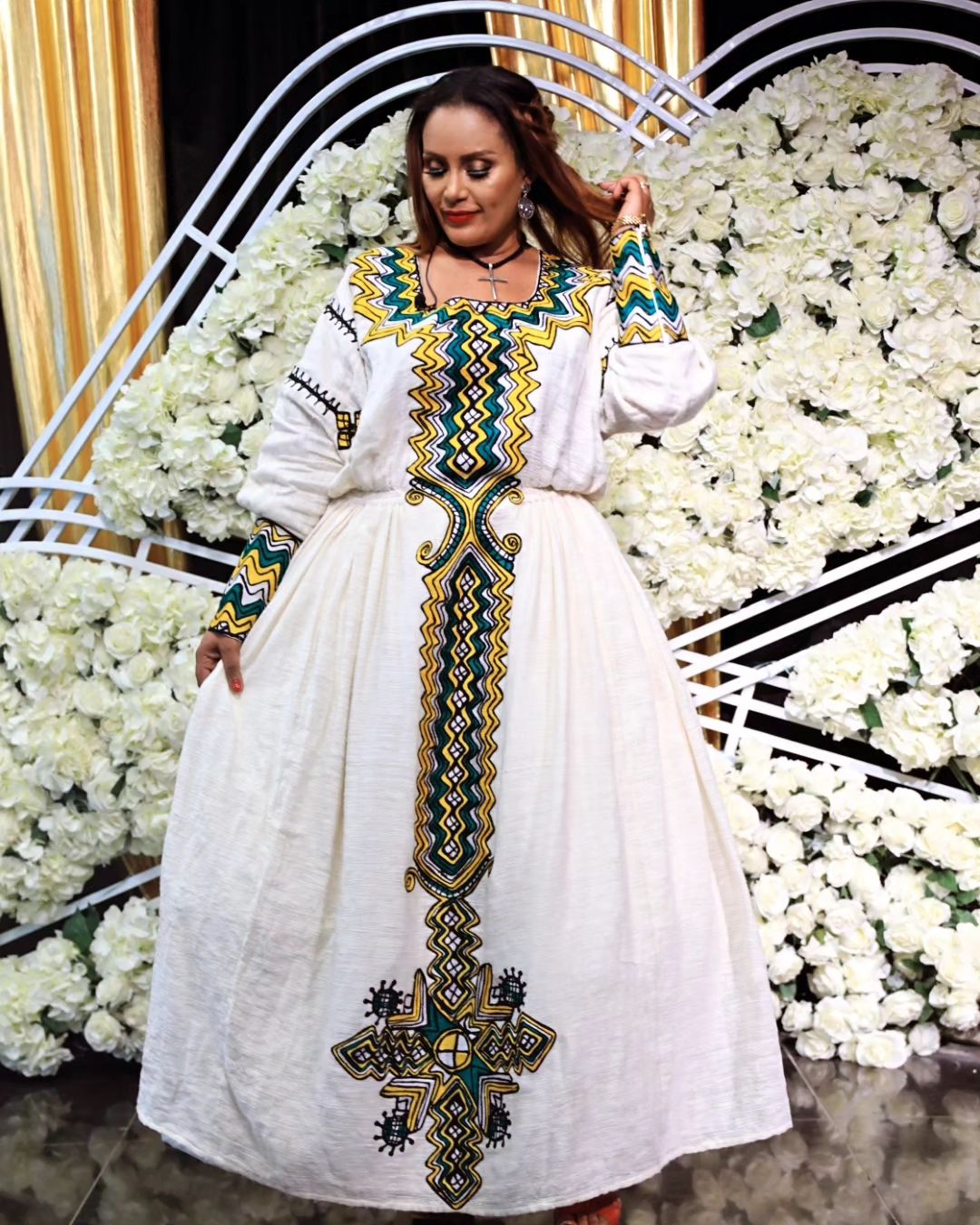 Artistry in Green: Intricately Patterned Tilet Habesha Kemis, a Fusion of Fetil Fabric and Cotton Elegance