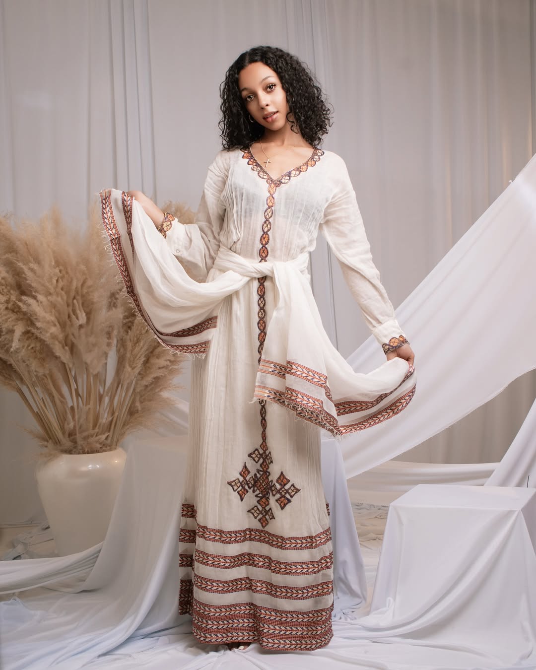 Effortless Elegance: Classic Habesha Kemis with Refined Red Detailing