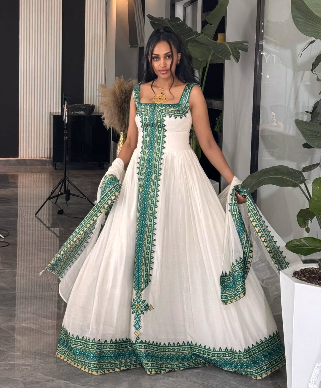Elegant Habesha Dress with Rich Green Embroidery and Contemporary Charm