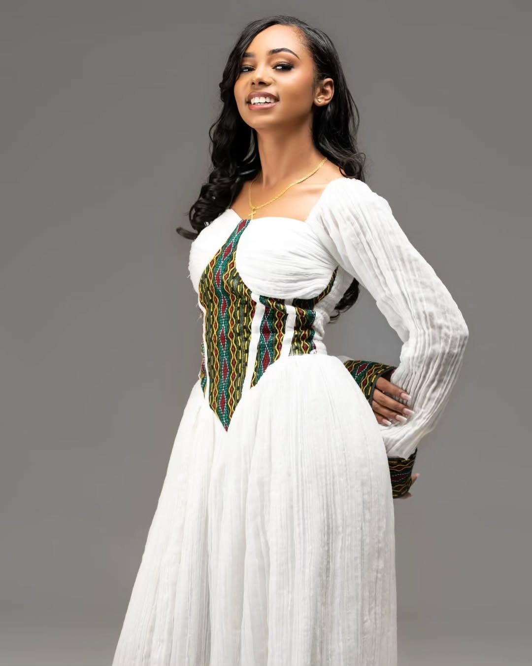 Vibrant White Habesha Kemis with Colorful Accents - Ethiopian Traditional Clothing