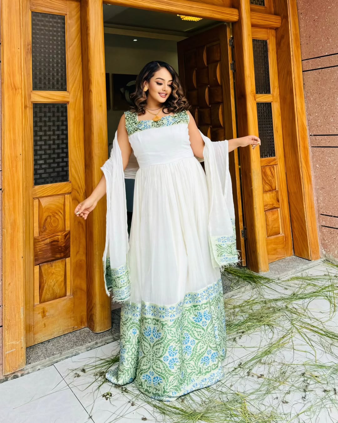 Stunning White Habesha Dress with Blue & Green Floral Patterns – Ethiopian Cultural Dress