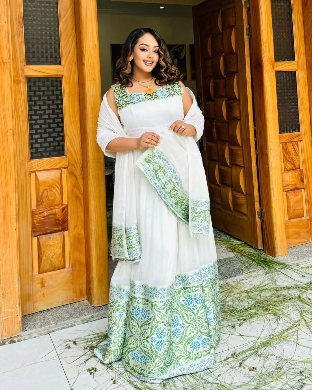 Stunning White Habesha Dress with Blue & Green Floral Patterns – Ethiopian Cultural Dress