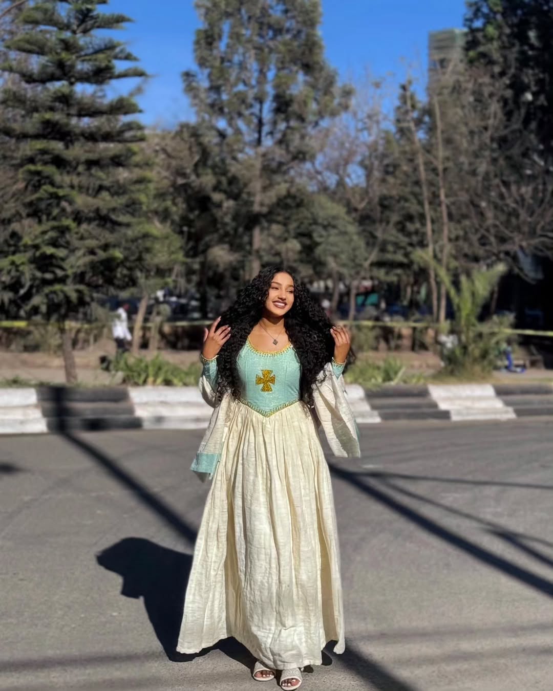 Simple yet stunning Light Blue Habesha Kemis with Gold Cross Embroidery - Ethiopian Dress