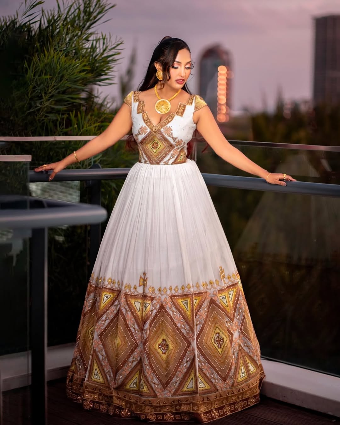 Elegant White Habesha Bridal Dress with Gold & Brown Patterns β Ethiopian Wedding Dress