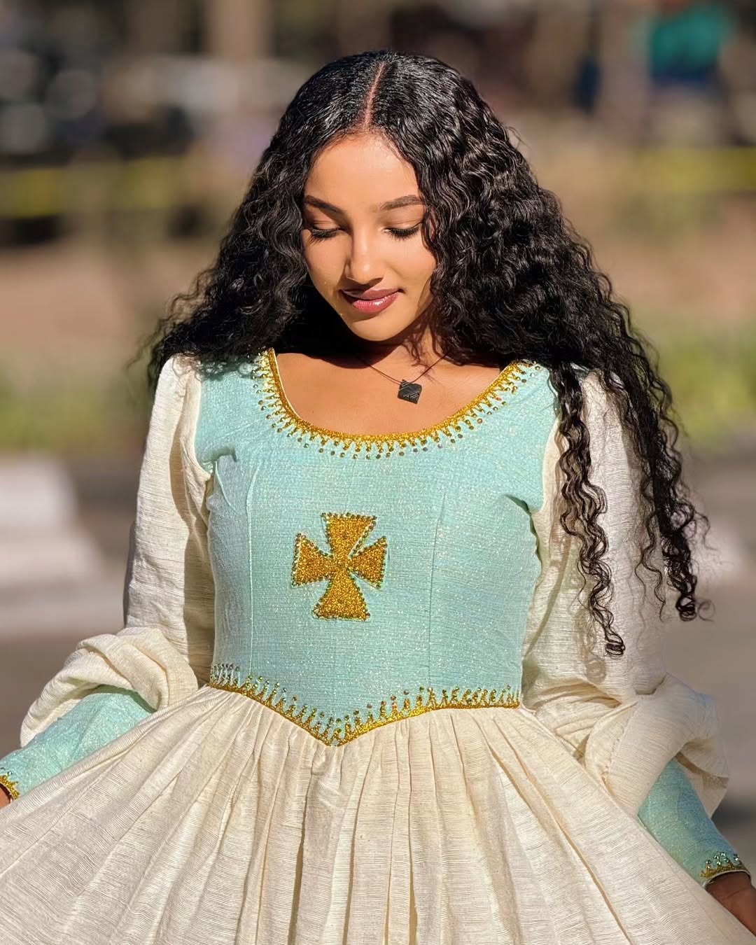 Simple yet stunning Light Blue Habesha Kemis with Gold Cross Embroidery - Ethiopian Dress