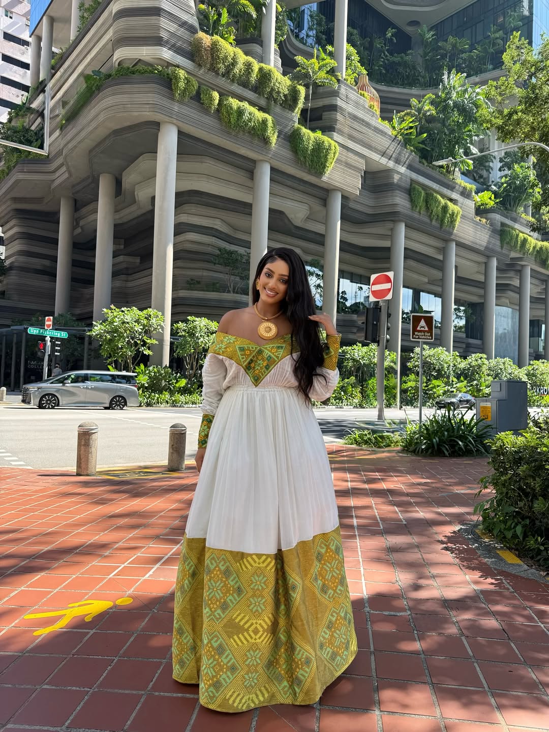 Modern Off-Shoulder Habesha Dress with Gold & Green Pattern - Traditional Ethiopian Dress