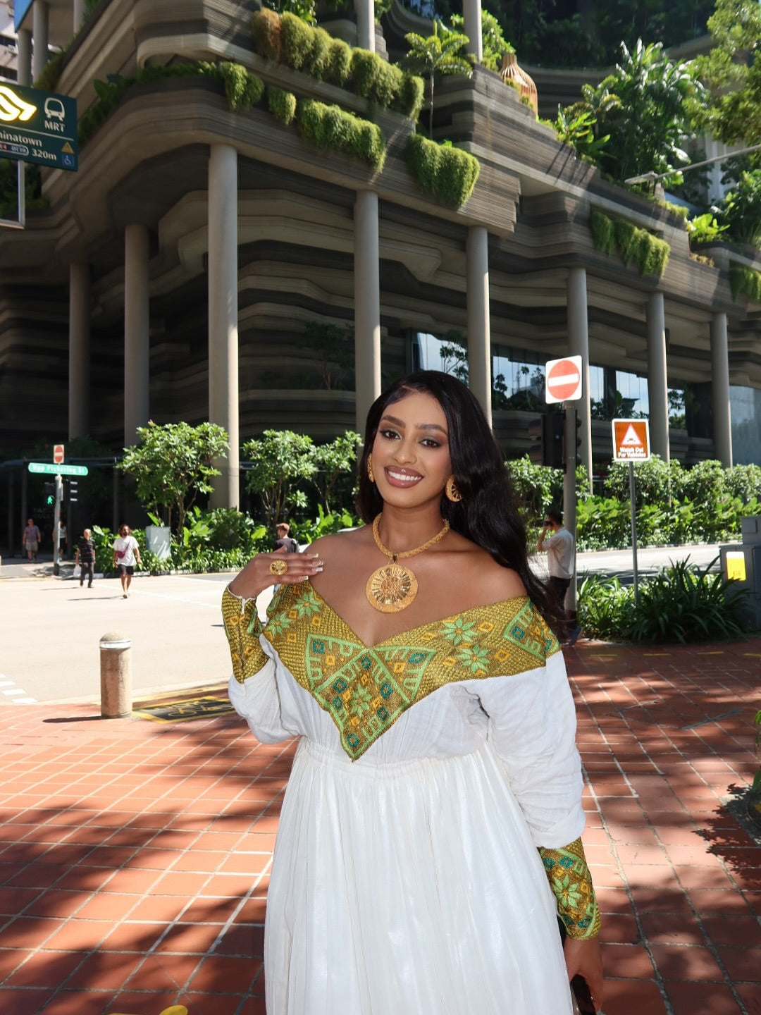 Modern Off-Shoulder Habesha Dress with Gold & Green Pattern - Traditional Ethiopian Dress