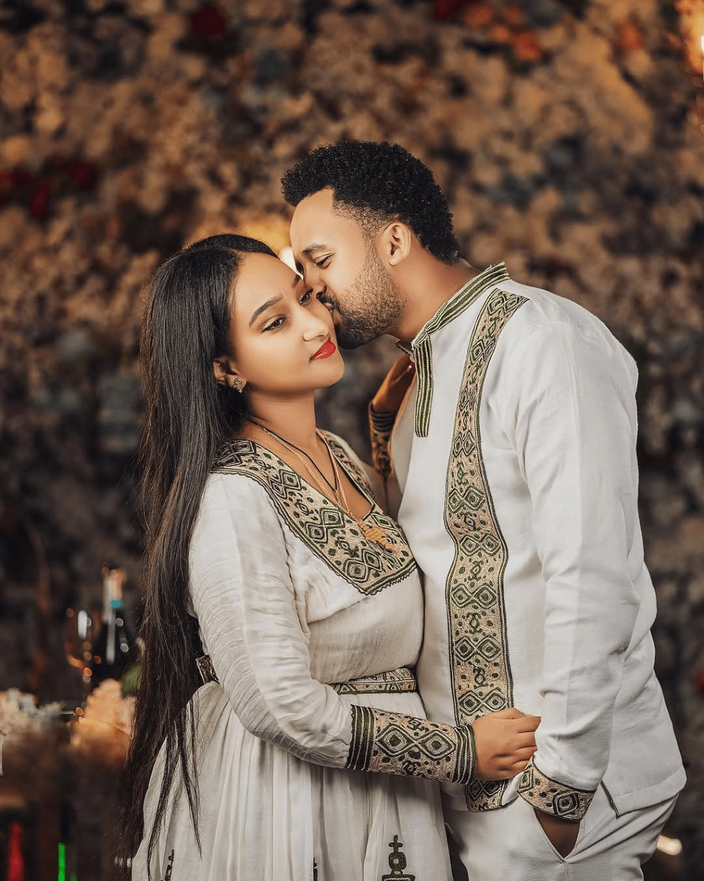 Silvered Elegance with Matching Habesha Couples Outfit: Majestic Ethiopian Wedding Attire
