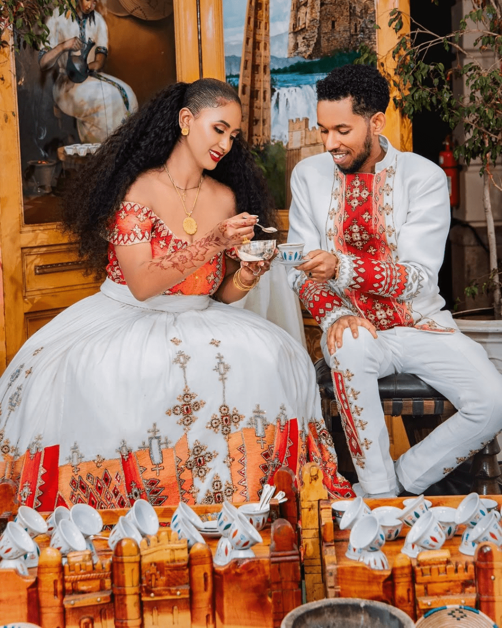 Breathtaking Red Habesha Couples Wedding Outfit: Golden Beaded Shimmering Matching Ethiopian Couples Attire