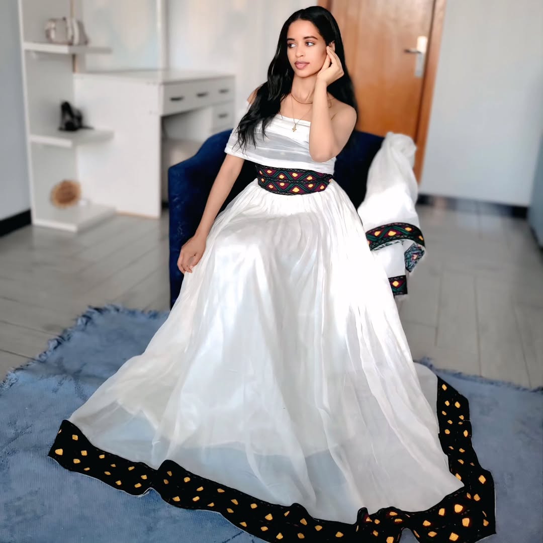 Beautiful Habesha Dress with Colorful Accents for Celebration