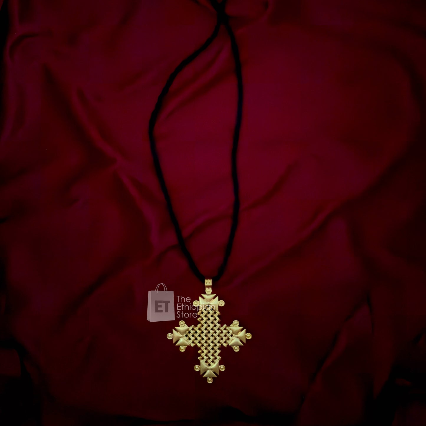 Ethioipan Golden Color Cross Necklace: with Black Thread as Chain Golden Color Necklace
