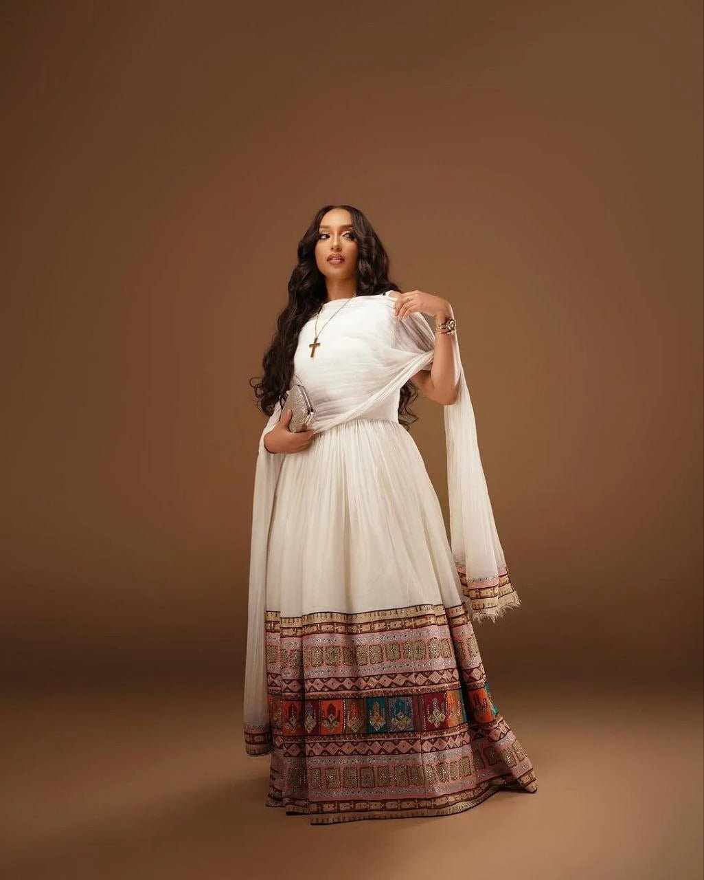 Elegant Sleeveless Habesha Dress with Vibrant Tilf: A Modern Ethiopian Dress