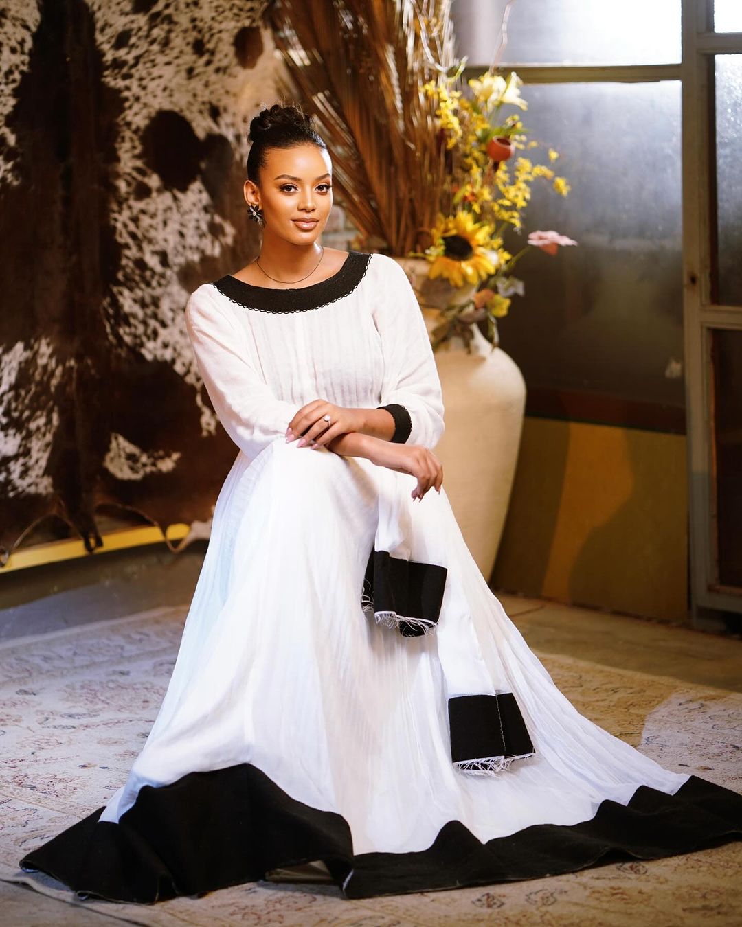 Contemporary Opulence: Black Menen Elegance in Modern Habesha Dress