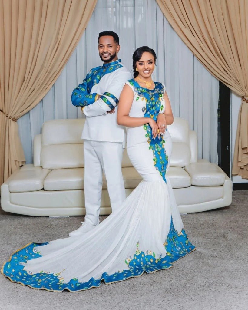 Stylish Couple in Traditional Attire with Blue Accents – Habesha Dress – Habesha Wedding Dress – Cultural Dress