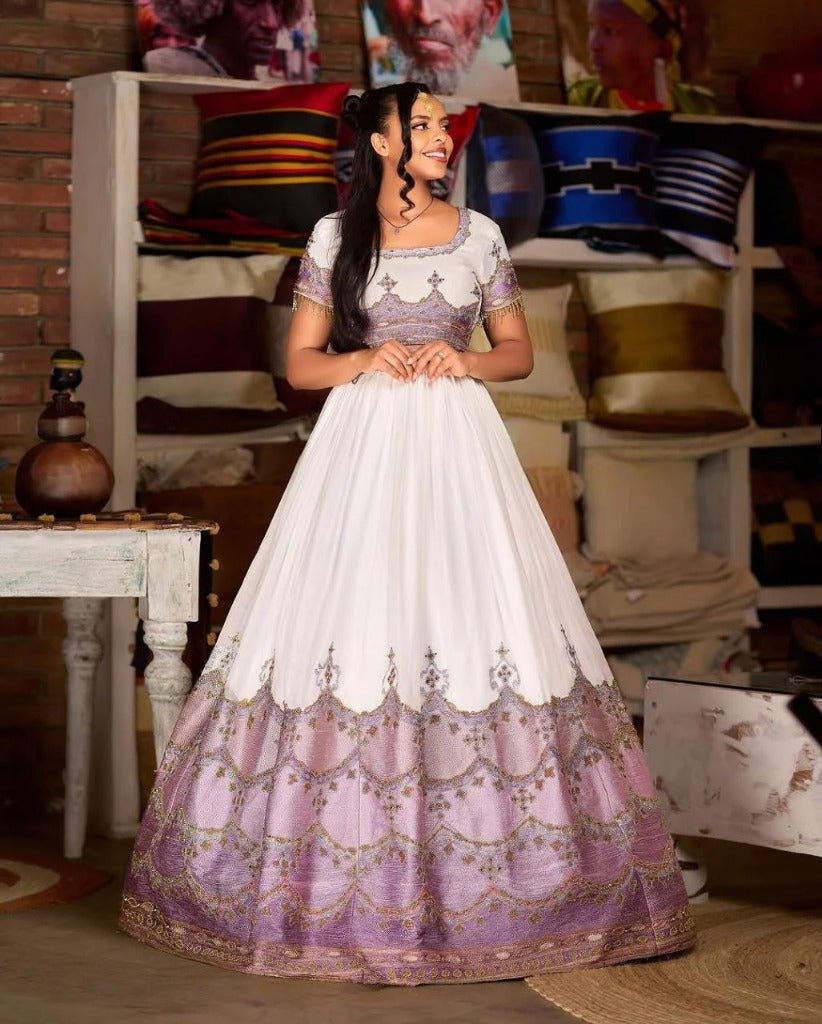 Stunning Ethiopian Traditional Wedding Dress in Lavender with Intricate Gold Detailing