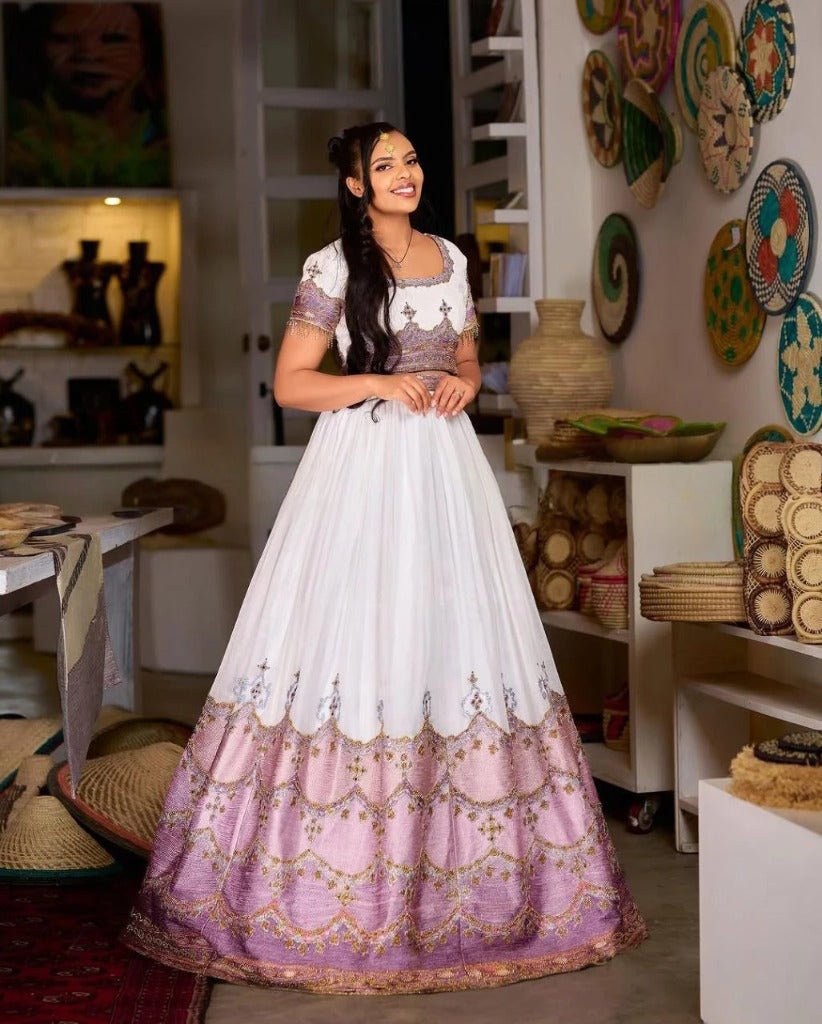 Stunning Ethiopian Traditional Wedding Dress in Lavender with Intricate Gold Detailing