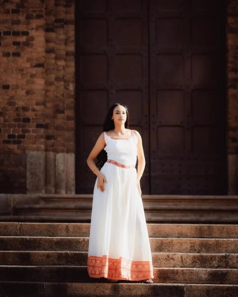 Simple Habesha Kemis with Bold Red Embroidery for an Event