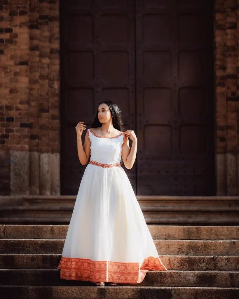 Simple Habesha Kemis with Bold Red Embroidery for an Event