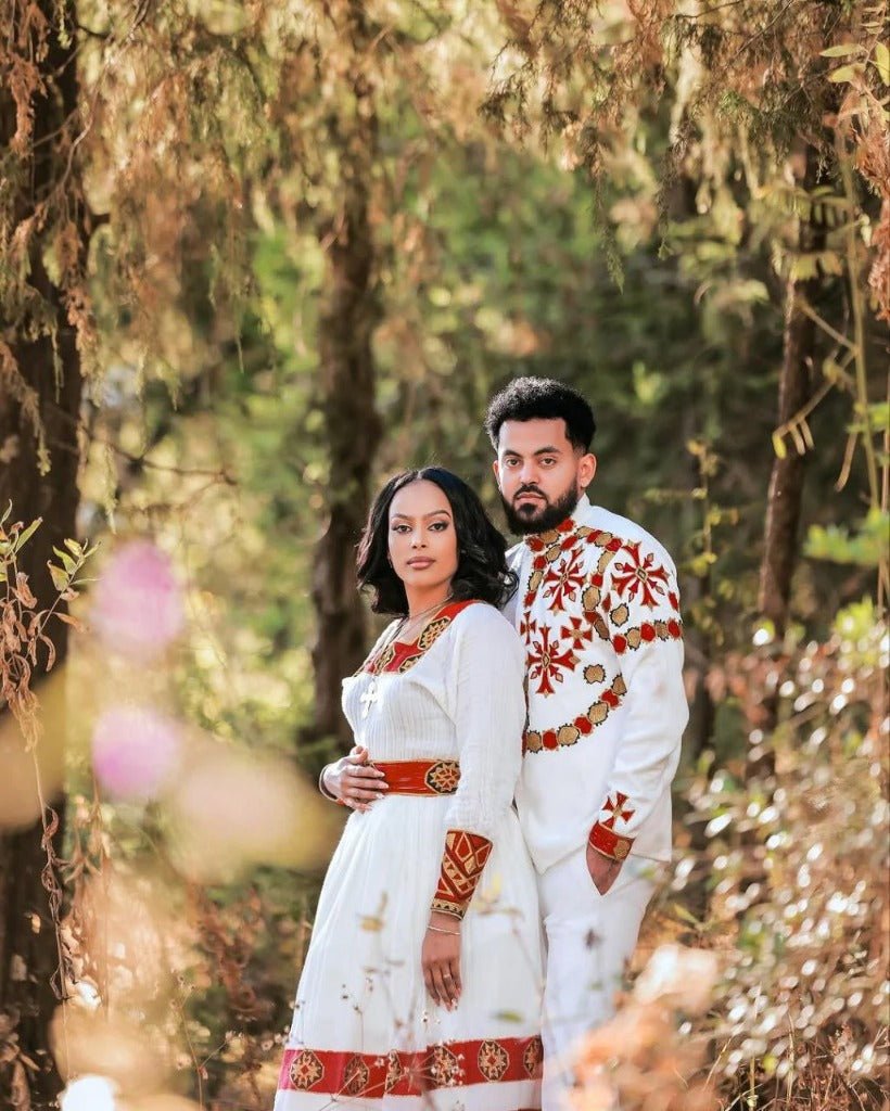 Elegant Habesha Wedding Couple’s Outfit with Rich Red and Gold Embroidery for Your Special Day