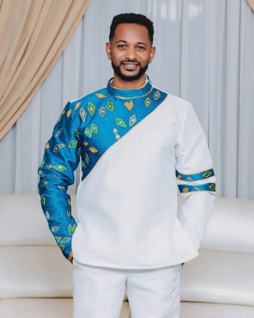 Stylish Couple in Traditional Attire with Blue Accents – Habesha Dress – Habesha Wedding Dress – Cultural Dress