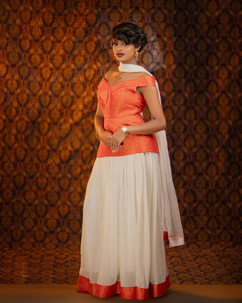 Chic Habesha Kemis with Orange Accents for Event