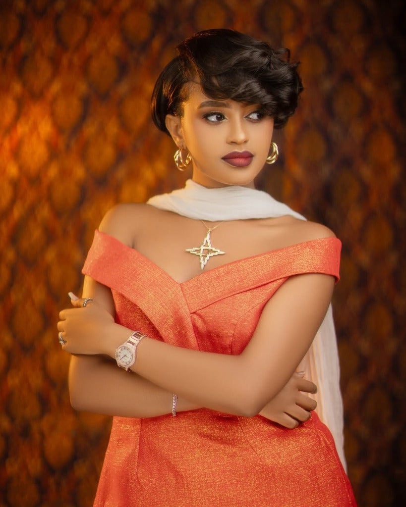 Chic Habesha Kemis with Orange Accents for Event