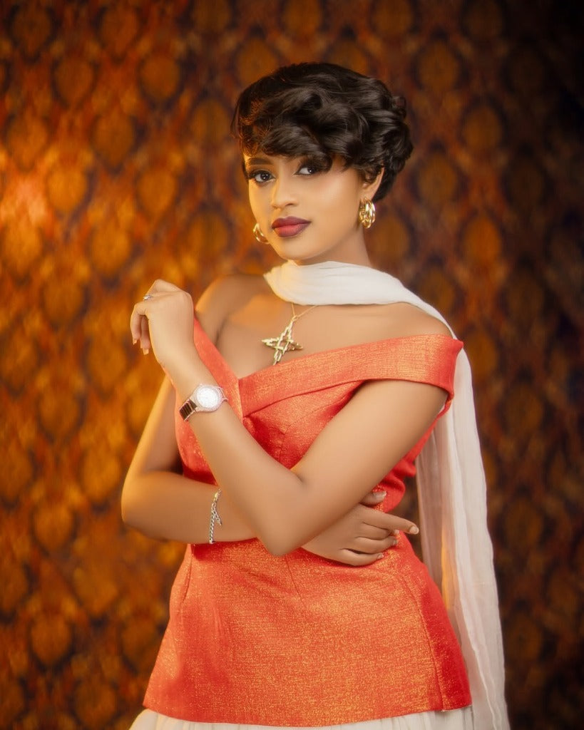 Chic Habesha Kemis with Orange Accents for Event