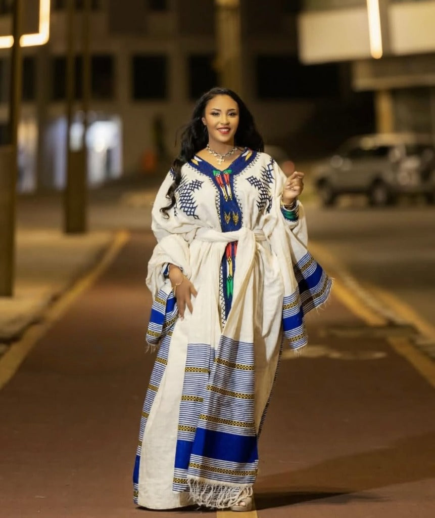 Elegant Habesha Kemis with Colorful Accents for Cultural Event