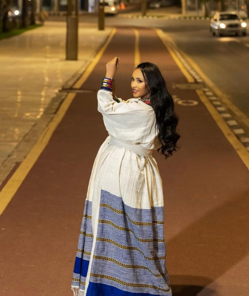 Elegant Habesha Kemis with Colorful Accents for Cultural Event