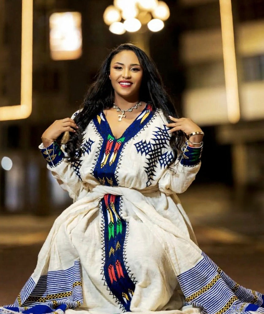Elegant Habesha Kemis with Colorful Accents for Cultural Event