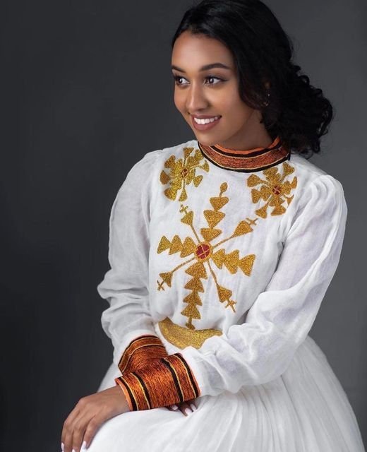A Menen Fabric Habesha Kemis with Brown and Yellow Tilf: Shimena