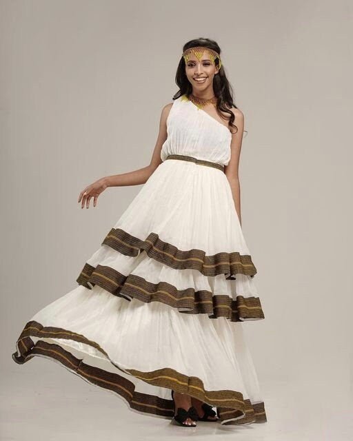 The Magnificence of an Oromo Traditional Dress with Menen Fabric and Full Shimena