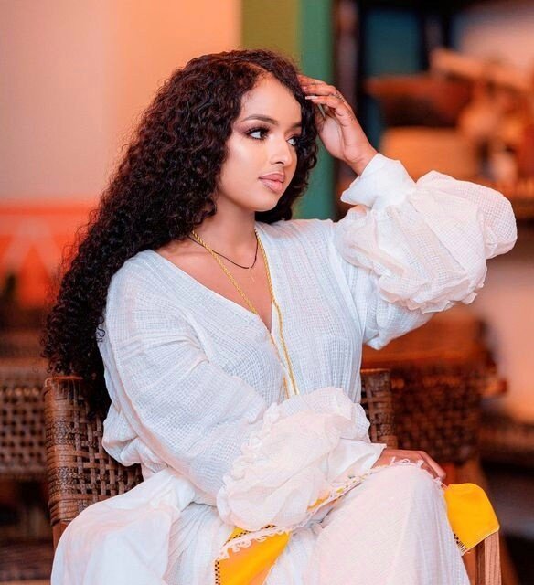 Sunshine in Menen Fabric: A Radiant Yellow Habesha Kemis