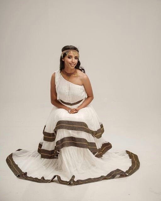 The Magnificence of an Oromo Traditional Dress with Menen Fabric and Full Shimena