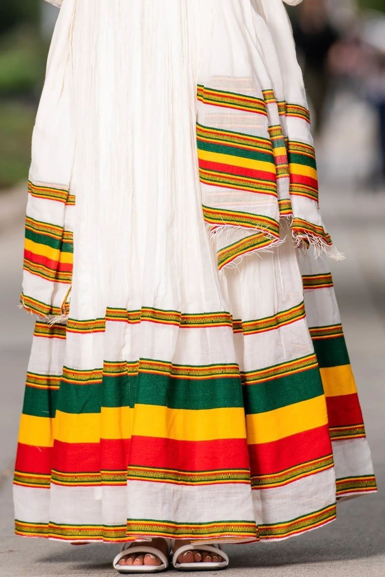 A Stunning Shimena Habesha Dress with Menen Fabric and Flag-Inspired Design, Habesha dress, Habesha kemis, Eritrean dress, Kemis, ሀበሻ