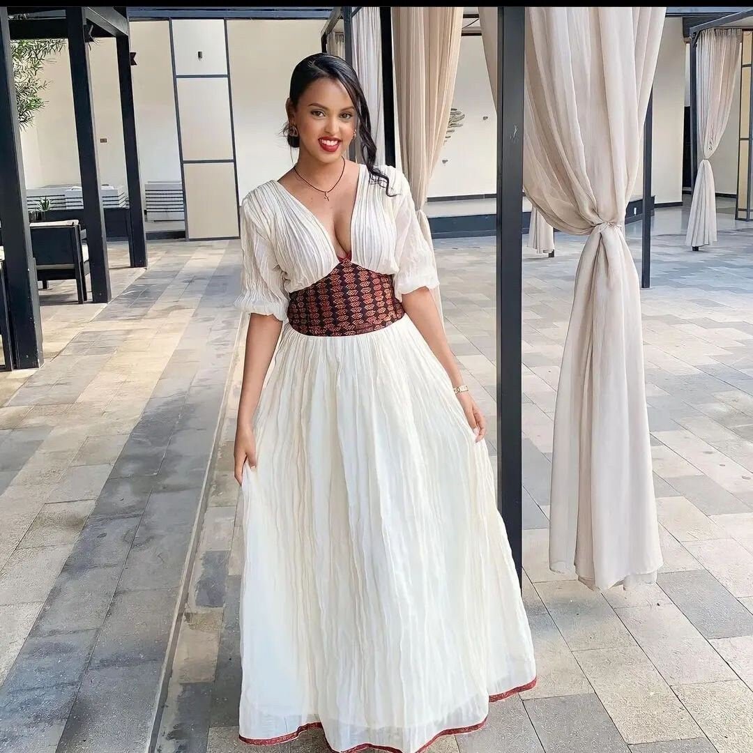 Simple & Stylish Corset Habesha Dress Modern Ethiopian Wear Simple & Stylish Corset Habesha Dress Modern Ethiopian Wear