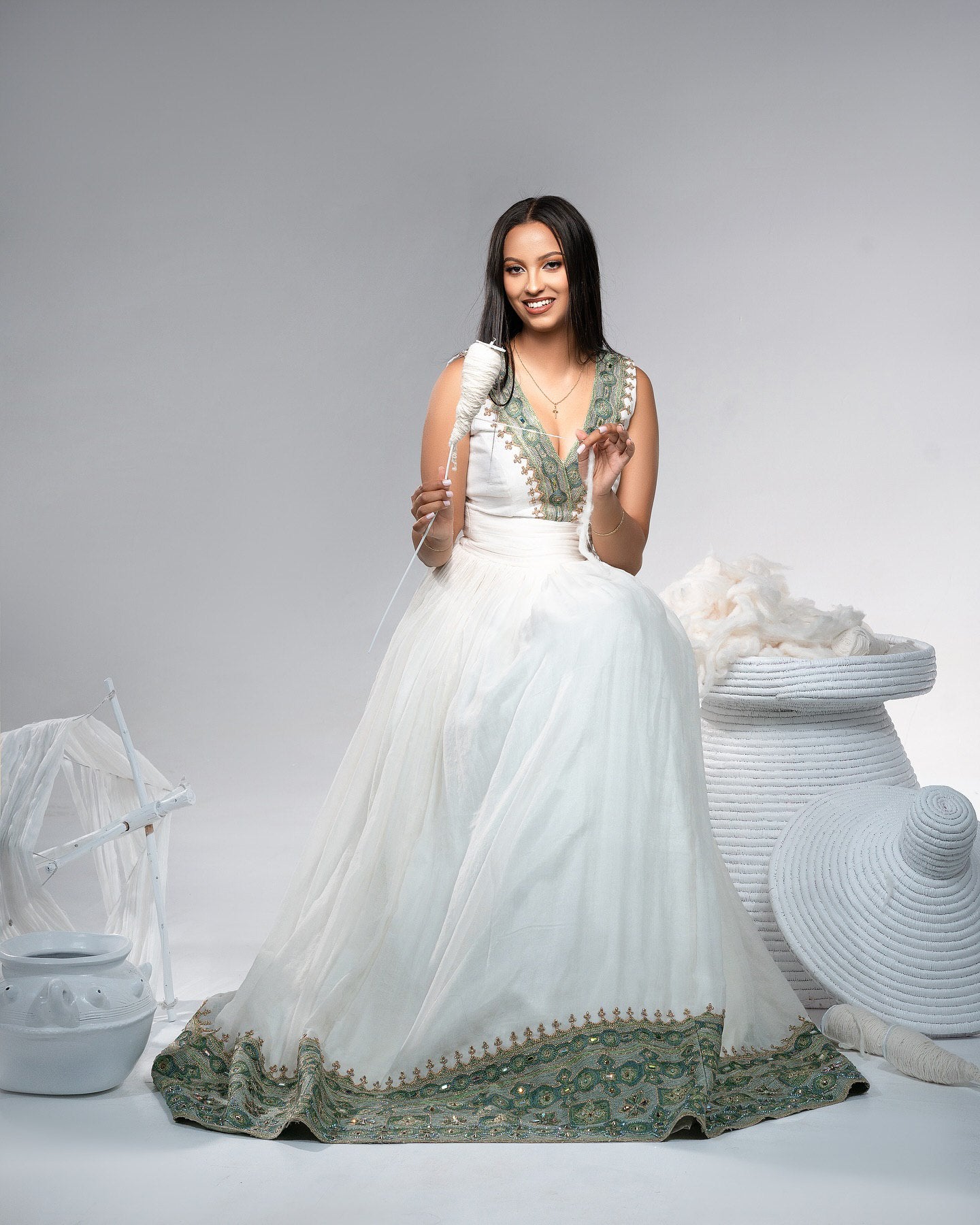 White Habesha Kemis with Green & Gold Tibeb | Elegant Ethiopian Cultural Dress