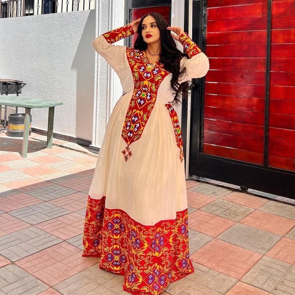 Vibrant Crimson Menen Marvel: Contemporary Handwoven Ethiopian Kemis