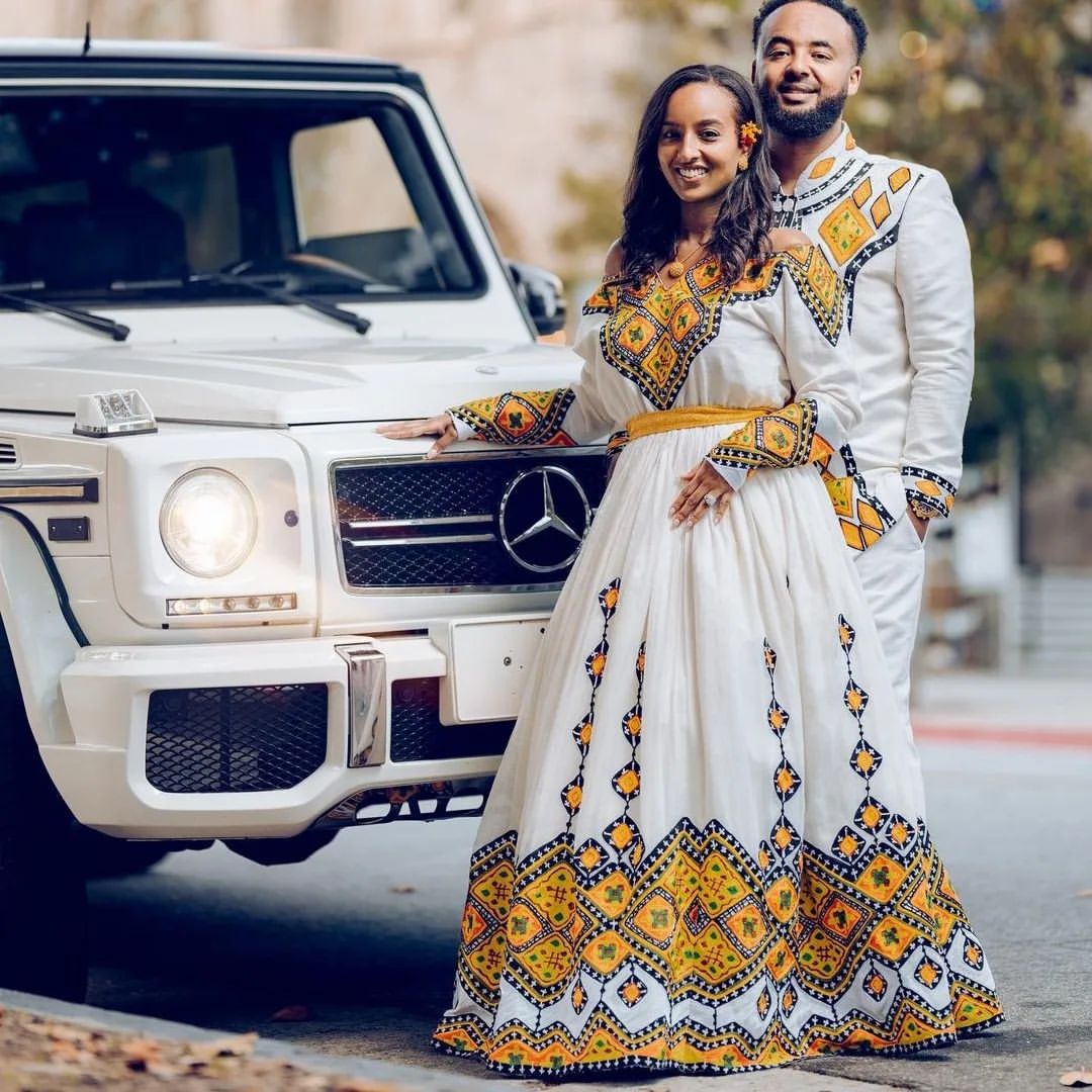 Beautiful Habesha Couples Outfit: Elegant Yellow Design in Traditional Habesha Couples Wedding Outfit