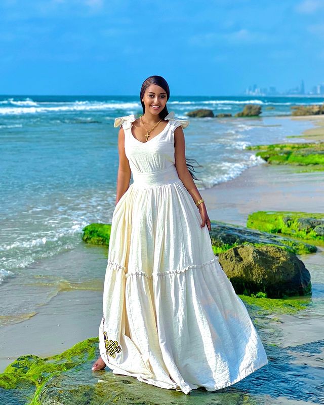 Modern Fusion Habesha Dress With a Cross Design at the bottom Traditional Ethiopian Dress