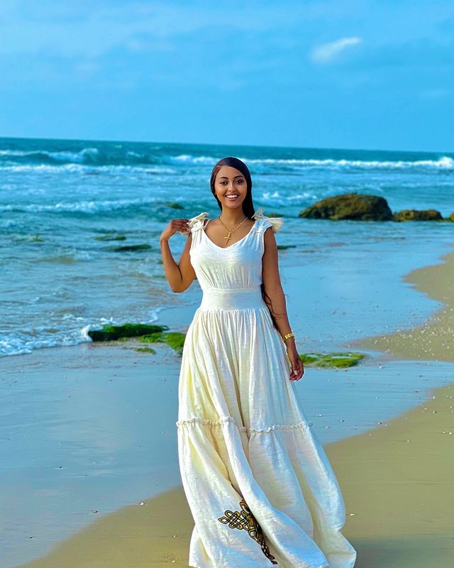 Modern Fusion Habesha Dress With a Cross Design at the bottom Traditional Ethiopian Dress