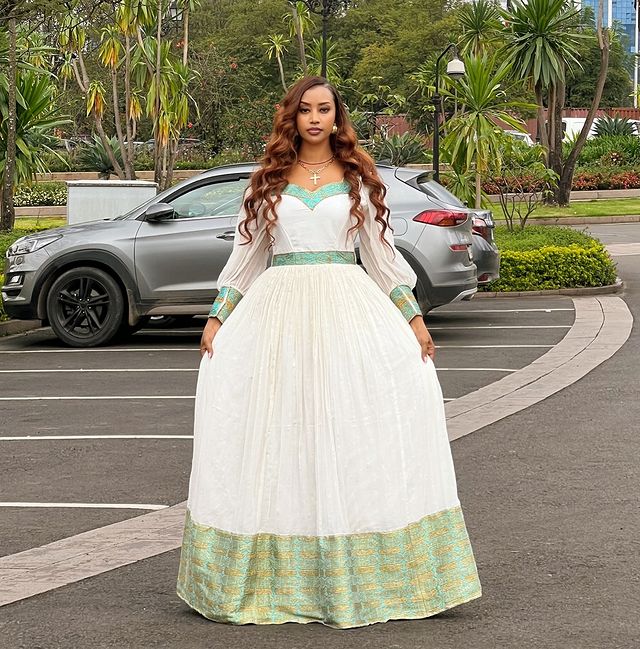 Beautiful Blue and Golden Design Habesha Dress