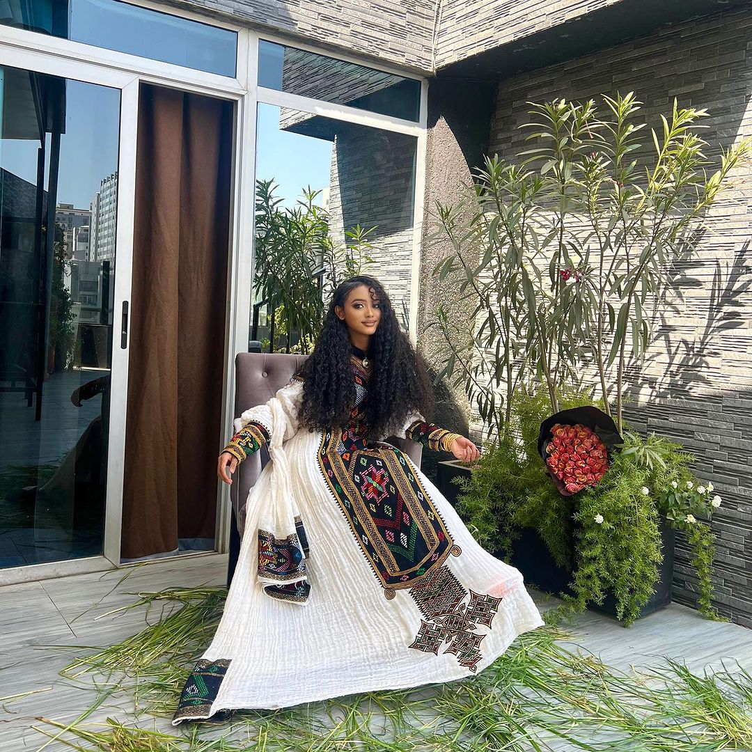 Majestic Embroidery Designed Habesha Dress: with Multicolored Stitches Traditional Ethiopian Dress