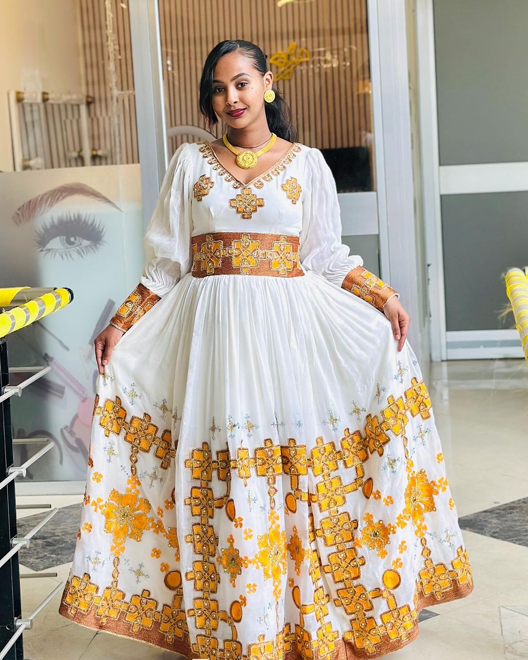 Beautiful Golden Habesha Kemis with Intricate Embroidery