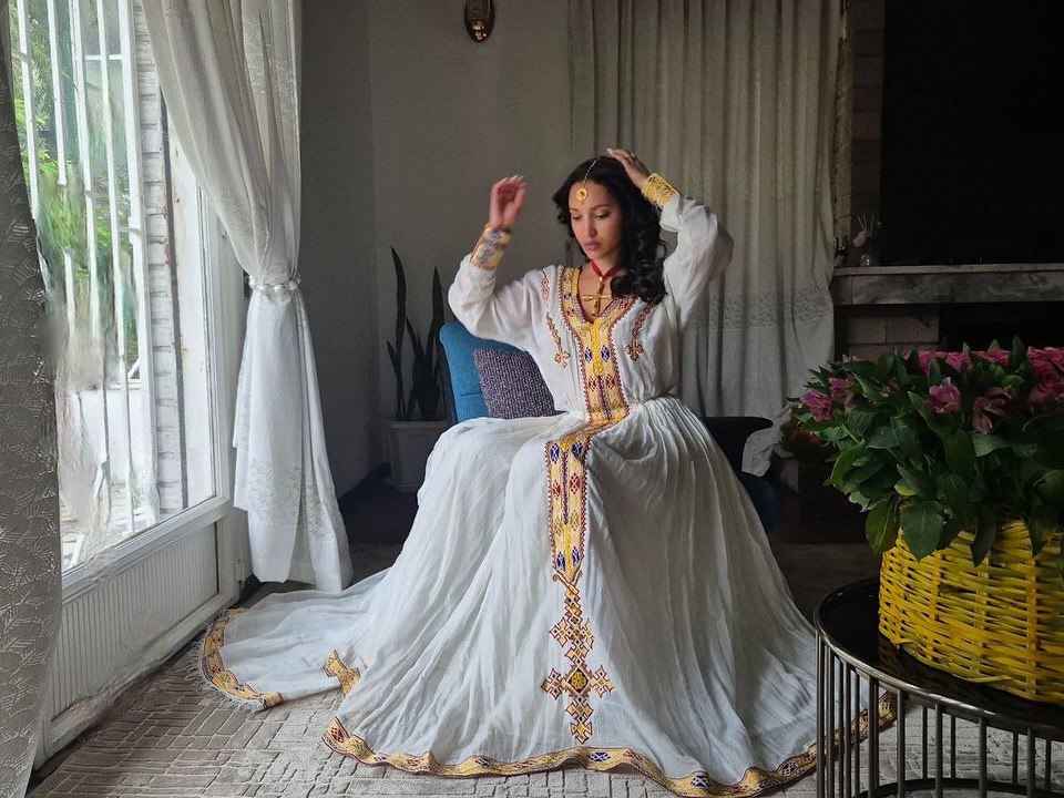 Simple Cross-Stitched Habesha Dress: with Multicolor Ornaments Traditional Ethiopian Dress