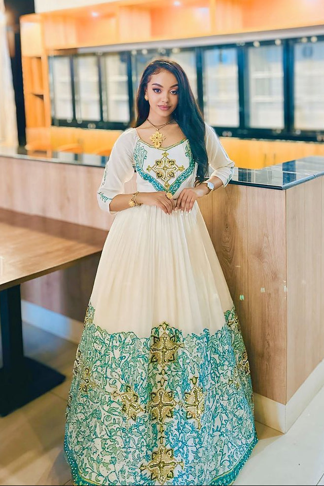 Ravissante robe éthiopienne traditionnelle bleue : Robe Habesha finement confectionnée à la main pour toutes les grandes fêtes et événements Habesha Kemis