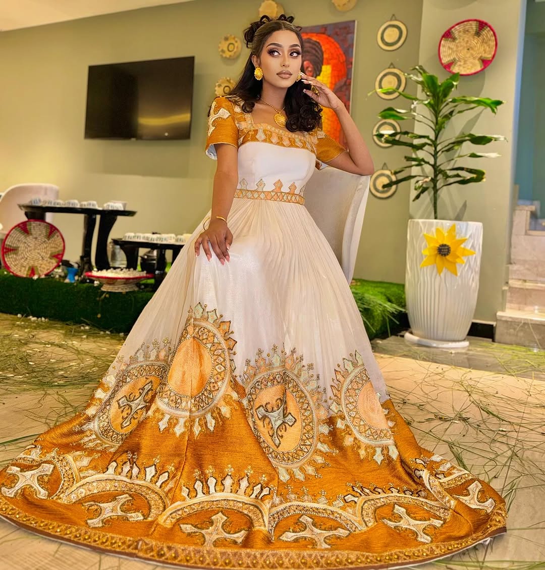 Shimmering Gold in Traditional Ethiopian Dress: Newly Designed Habesha Dress Beautifully Handcrafted Eritrean Clothing