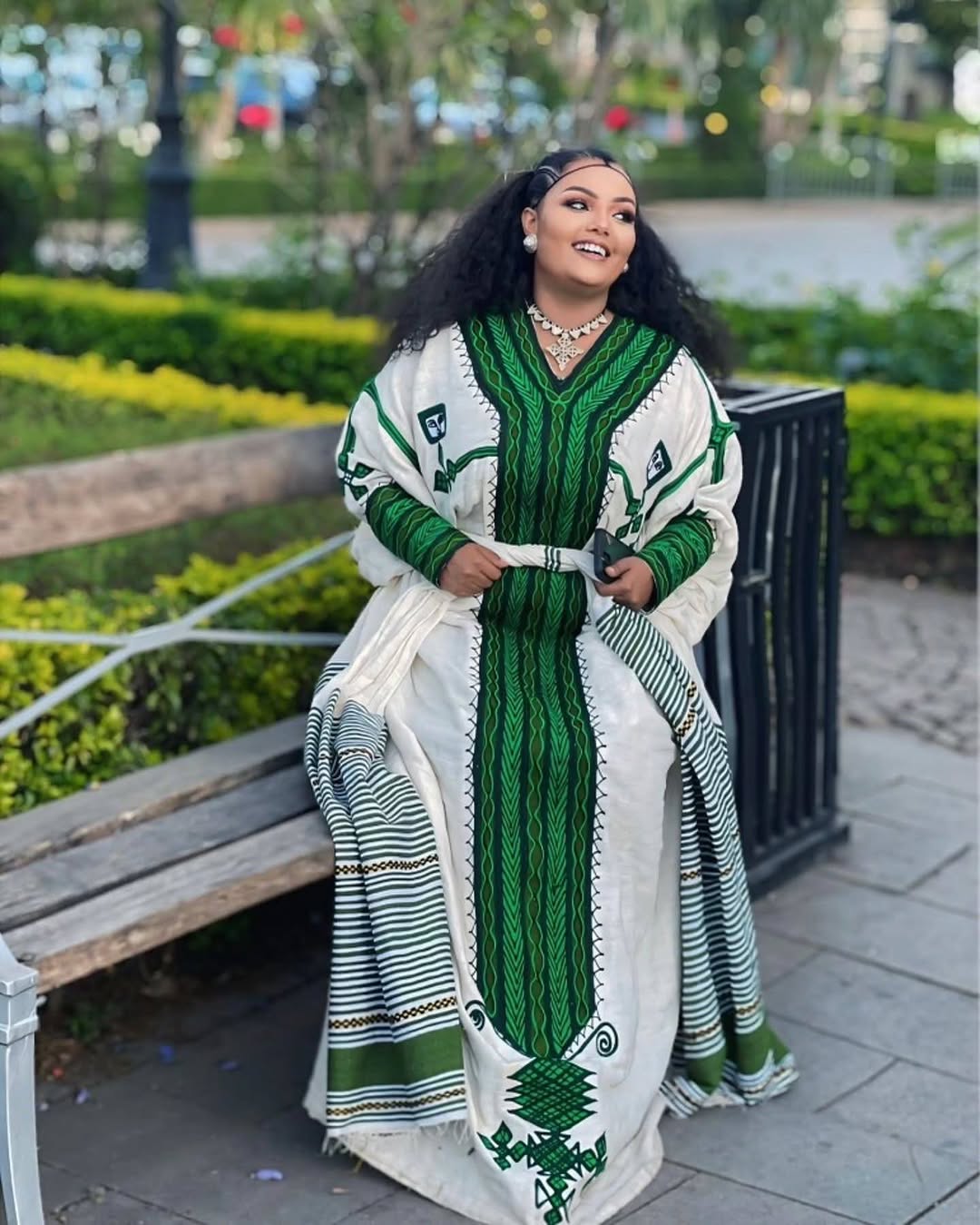 Radiant Black and Green Tilet Habesha Dress: Elegant Detailing for Every Glamorous Celebration